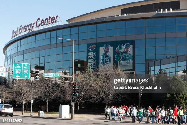 Fans make their way to the Xcel Energy Center prior to the game between the Minnesota Wild and the Arizona Coyotes on November 27, 2022 in Saint...