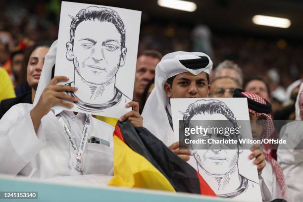 Local support for former German player Mesut Ozil during the FIFA World Cup Qatar 2022 Group E match between Spain and Germany at Al Bayt Stadium on...