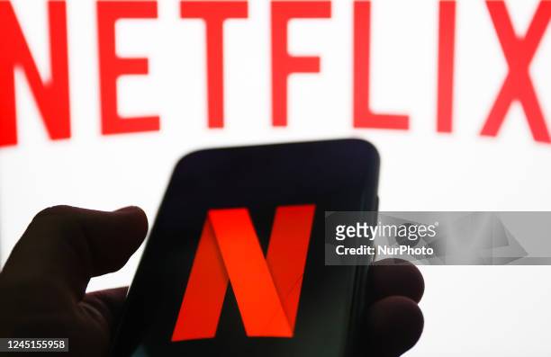 Netflix icon displayed on a phone screen and Netflix website displayed on a laptop screen are seen in this illustration photo taken in Krakow, Poland...
