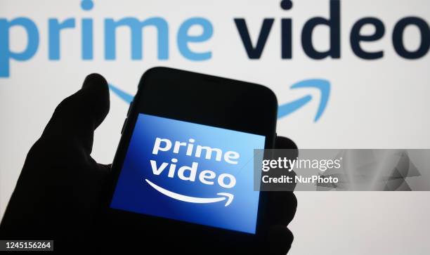 Prime Video icon displayed on a phone screen and Prime Video website displayed on a laptop screen are seen in this illustration photo taken in...