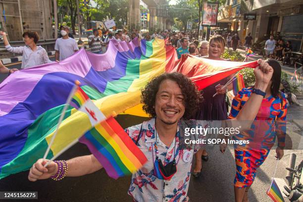 People seen marching on the road during the Thailand Pride Parade 2022. Thailand's LGBTQI groups and foreigners attended Thailand Pride Parade 2022...