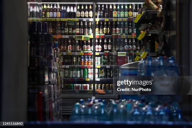 An alcohol stand is seen inside a grocery shop in Krakow, Poland on November 27, 2022. Most of the shops are closed most sundays in Poland....
