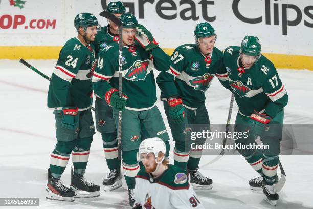 Matt Dumba, Jonas Brodin, Joel Eriksson Ek, Kirill Kaprizov and Marcus Foligno of the Minnesota Wild celebrate a goal against the Arizona Coyotes...