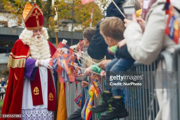 Sinterklass from Holland is seen greeted by people at Uerdingen port in Uerdingen, Germany on Nov.27, 2022