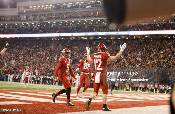 Washington State Cougars wide receiver Robert Ferrel motions to the crowd after scoring a touchdown during the game between the Washington Huskies...