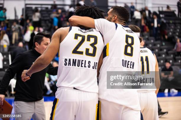 Jermaine Samuels and Trevelin Queen of the Fort Wayne Mad Ants celebrate a win over the Motor City Cruise on November 27, 2022 at Wayne State...