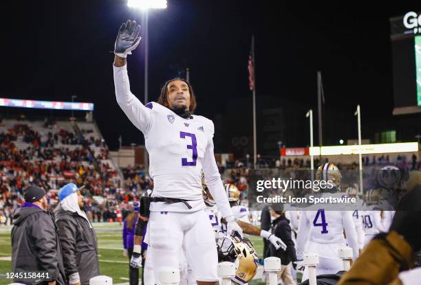 Washington Huskies wide receiver Taj Davis waves to the crowd during the game between the Washington Huskies and the Washington State Cougars on...