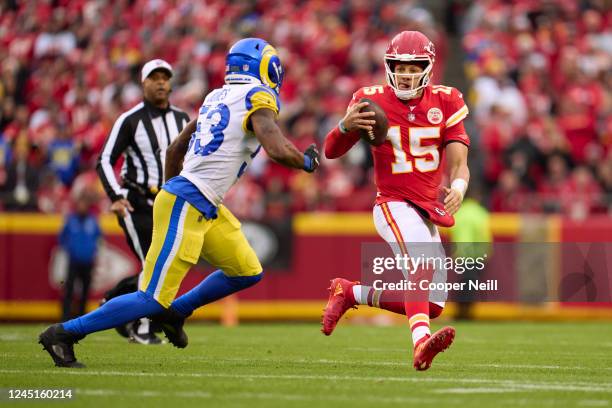 Patrick Mahomes of the Kansas City Chiefs scrambles against the Los Angeles Rams during the first half at GEHA Field at Arrowhead Stadium on November...