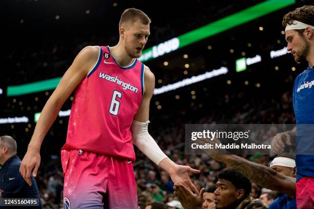 Kristaps Porzingis of the Washington Wizards reacts during the second half of a game against the Boston Celtics at TD Garden on November 27, 2022 in...