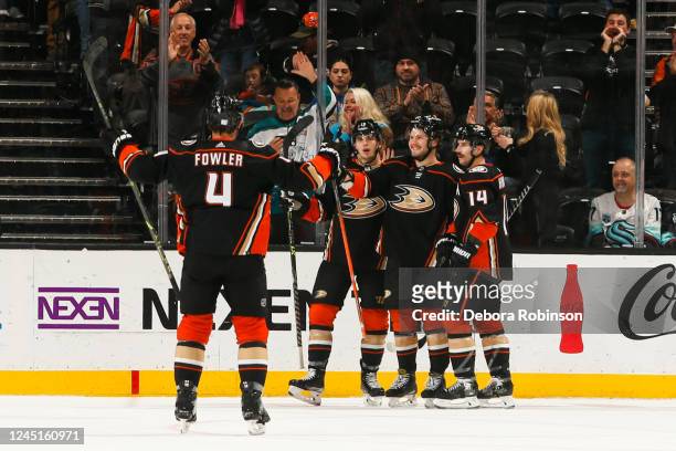 November 27: Mason McTavish of the Anaheim Ducks celebrates his goal with teammates during the second period against the Seattle Kraken at Honda...