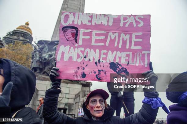 Protester holds a placard expressing her opinion during the demonstration. For the sixth consecutive year, the civil society associations federated...
