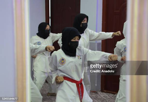 Afghan girls practice Taekwondo exercises in a secret Taekwondo club in Kabul, Afghanistan, on November 17, 2022.