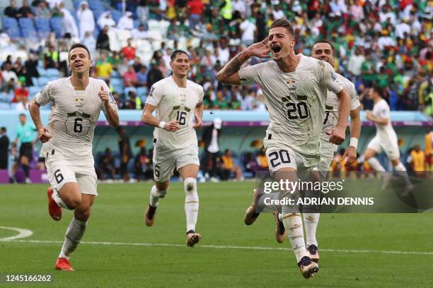 Serbia's midfielder Sergej Milinkovic-Savic celebrates scoring his team's second goal during the Qatar 2022 World Cup Group G football match between...