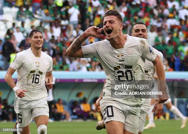 Serbia's midfielder Sergej Milinkovic-Savic celebrates scoring his team's second goal during the Qatar 2022 World Cup Group G football match between...