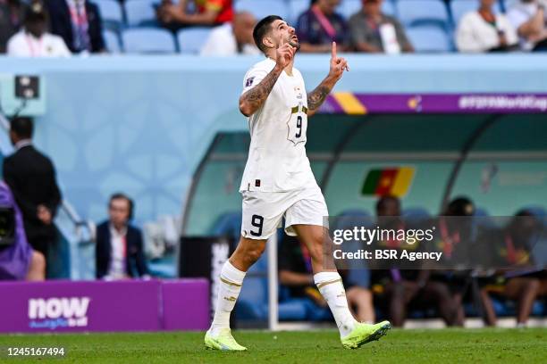 Aleksandar Mitrovic of Serbia celebrates after scoring his sides third goal during the Group G - FIFA World Cup Qatar 2022 match between Cameroon and...