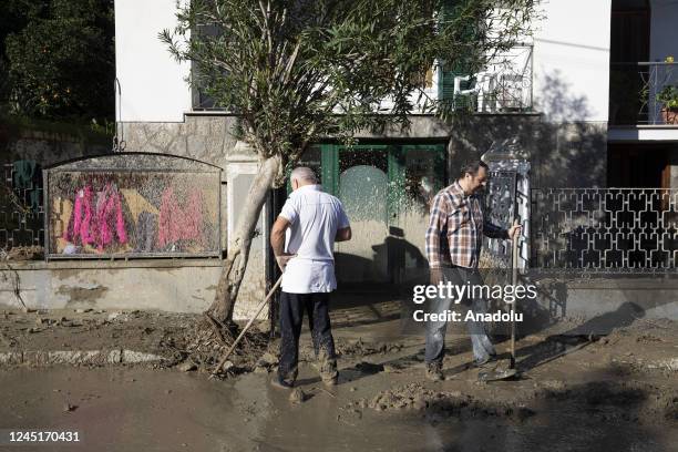 People work following a landslide on the Italian holiday island of Ischia, Southern Italy on November 27, 2022.
