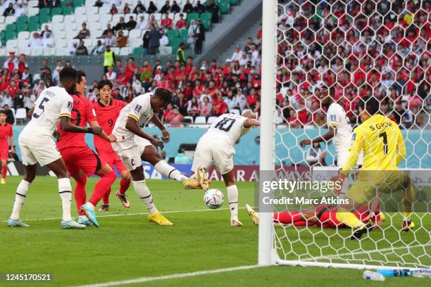 Mohammed Salisu of Ghana scores the opening goal during the FIFA World Cup Qatar 2022 Group H match between Korea Republic and Ghana at Education...