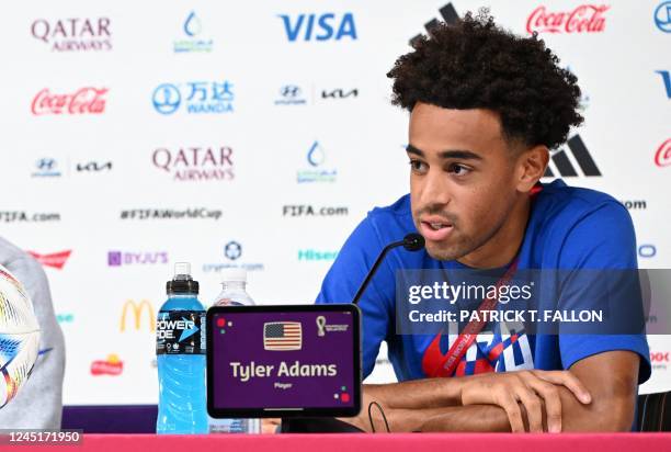 S midfielder Tyler Adams gives a press conference at the Qatar National Convention Center in Doha on November 28 on the eve of the Qatar 2022 World...