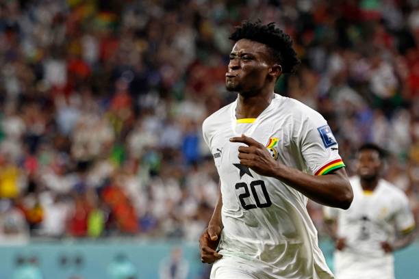 Ghana's midfielder Mohammed Kudus celebrates scoring his team's third goal during the Qatar 2022 World Cup Group H football match between South Korea...
