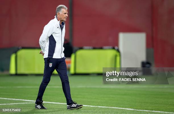Iran's Portuguese coach Carlos Queiroz heads a training session at Al Rayyan SC in the Al Rayyan district in Doha on November 28 on the eve of the...