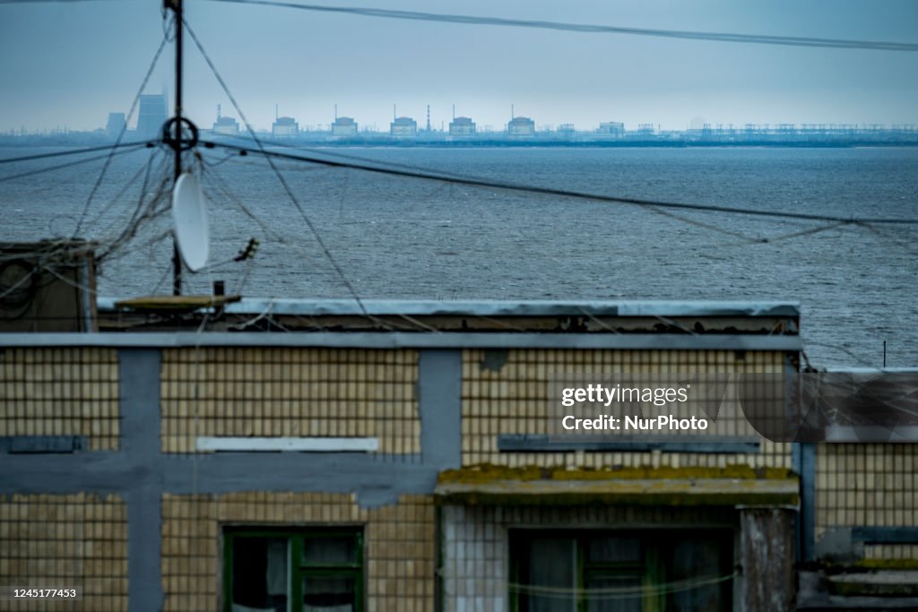 Nikopol Building View of the Zaporizhzhia NPP reactors from the balcony of a building ...