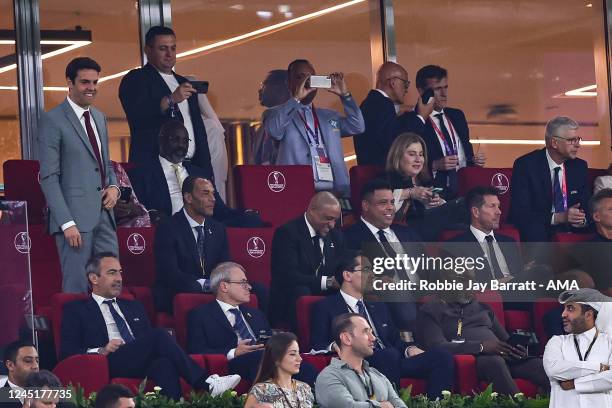 Former Brazil players Kaka, Cafu, Roberto Carlos and Ronaldo watch the match along side Diego Simeone the current manager of Athletico Madrid during...