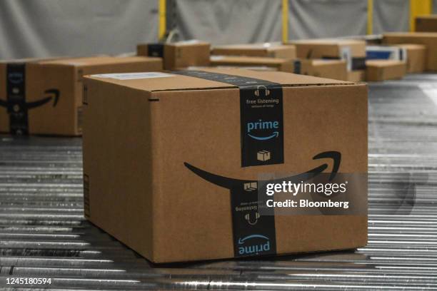 Packages move along a conveyor belt at an Amazon Fulfillment center on Cyber Monday in Robbinsville, New Jersey, US, on Monday, Nov. 28, 2022. US...