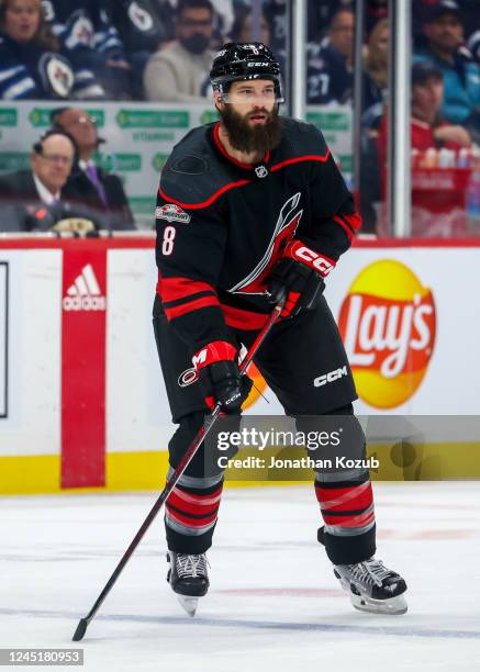 Brent Burns of the Carolina Hurricanes skates during first period action against the Winnipeg Jets at Canada Life Centre on November 21, 2022 in...