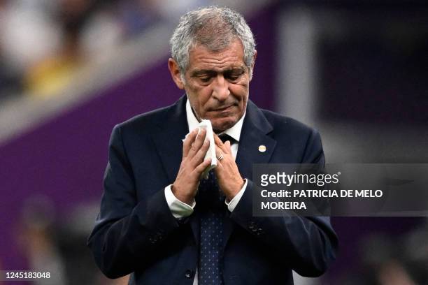 Portugal's coach Fernando Santos reacts during the Qatar 2022 World Cup Group H football match between Portugal and Uruguay at the Lusail Stadium in...