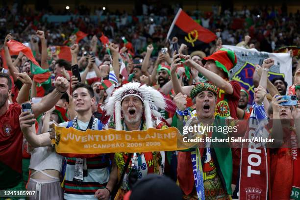 Portuguese fans celebrate during the FIFA World Cup Qatar 2022 Group H match between Portugal v Uruguay at Al Janoub Stadium on November 28, 2022 in...