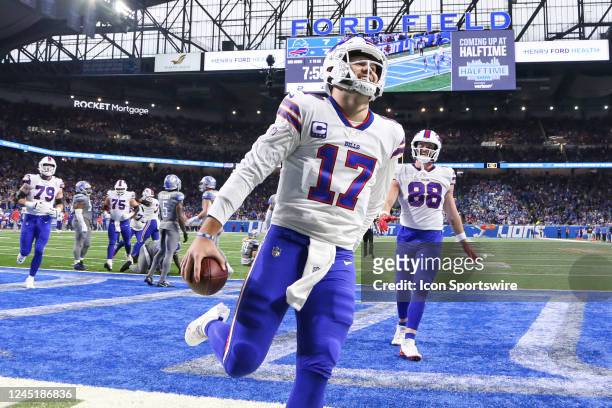 Buffalo Bills quarterback Josh Allen runs with the ball into the end zone for a touchdown during a regular season NFL football game between the...
