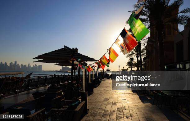 November 2022, Qatar, Doha: Soccer, World Cup 2022 in Qatar, country and people, small flags of the participating countries of the World Cup are seen...