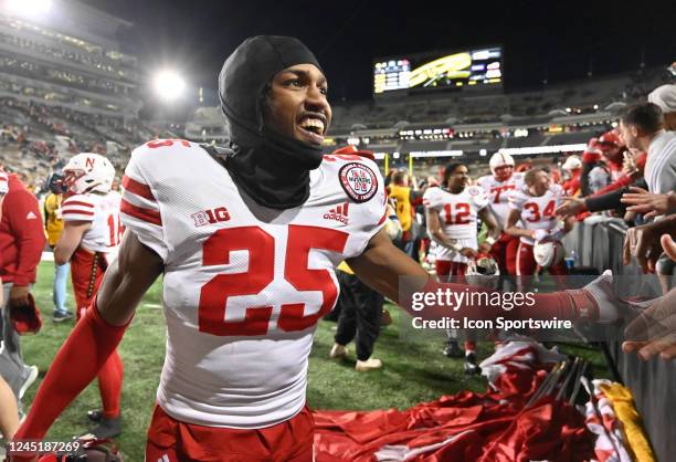 Nebraska defensive back Javier Morton celebrates with fans after winning a college football game between the Nebraska Cornhuskers and the Iowa...