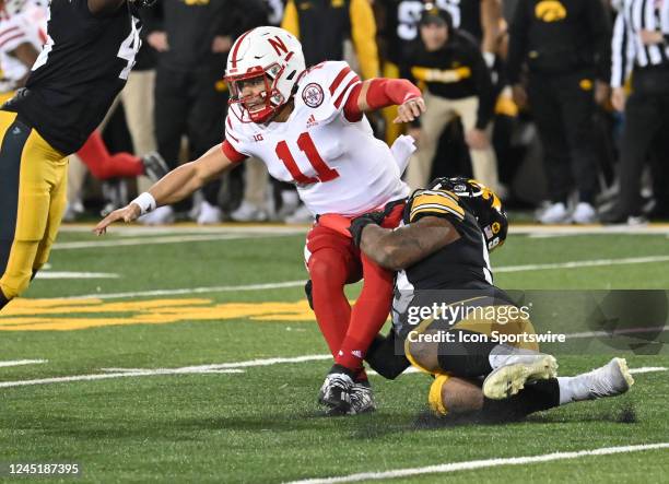 Iowa left defensive tackle Noah Shannon tackles Nebraska quarterback Casey Thompson during a college football game between the Nebraska Cornhuskers...