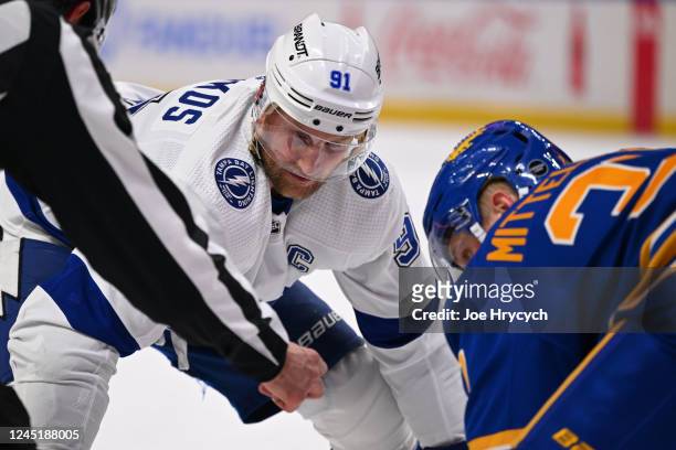 Steven Stamkos of the Tampa Bay Lightning lines up for a faceoff against Casey Mittelstadt of the Buffalo Sabres during an NHL game on November 28,...