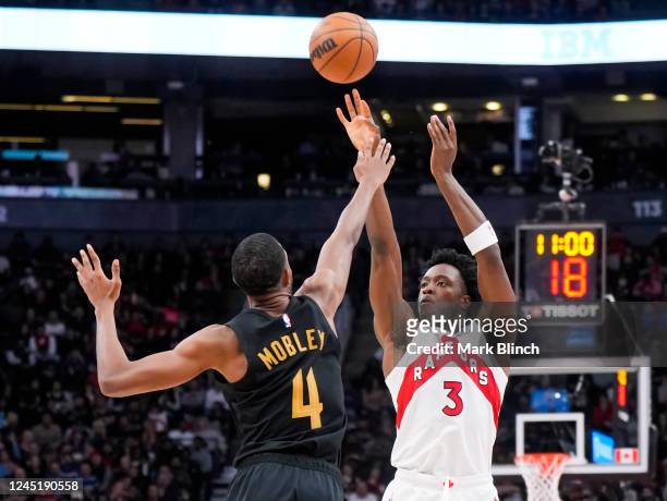 Anunoby of the Toronto Raptors shoots over Evan Mobley of the Cleveland Cavaliers during the second half of their basketball game at the Scotiabank...