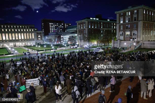 People gather at Columbia University during a protest in support of demonstrations held in China calling for an end to Covid-19 lockdowns, in New...
