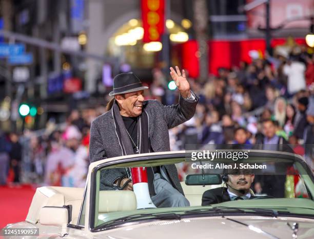 Hollywood, CA Actor Danny Trejo waves as he serves as the grand marshal of the parade at The 90th anniversary Hollywood Christmas Parade in Hollywood...