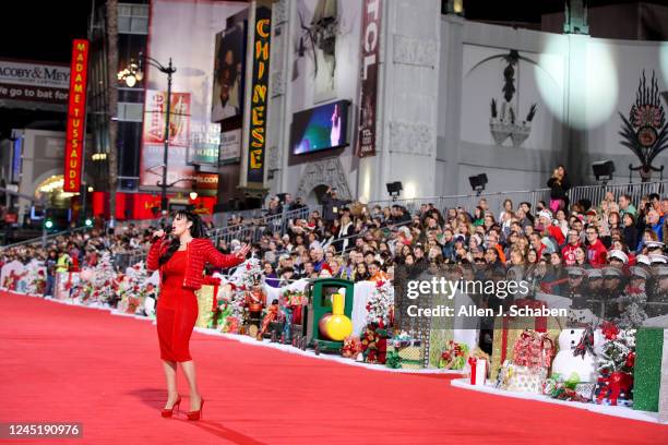 Hollywood, CA Anna Azerli sings Silent Night during the opening of The 90th anniversary Hollywood Christmas Parade on Hollywood Blvd. In Hollywood...