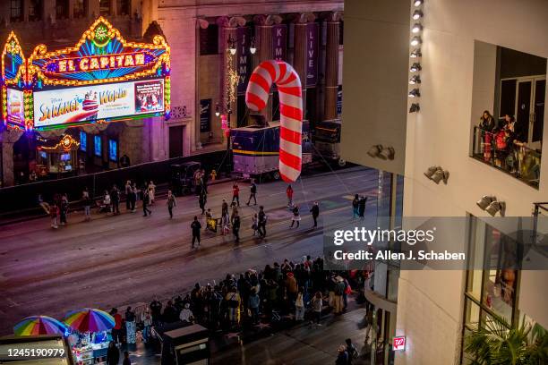Hollywood, CA The 25 Candy Cane balloon is wrangled by the U.S. Army Rangers Association during The 90th anniversary Hollywood Christmas Parade in...