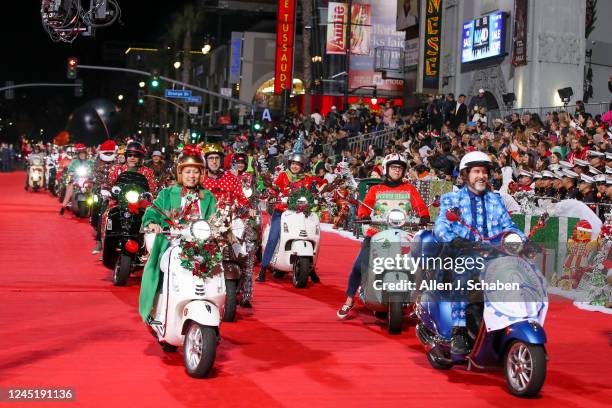 Hollywood, CA Members of the LA Vespa Club ride on the red carpet at The 90th anniversary Hollywood Christmas Parade in Hollywood Sunday, Nov. 27,...