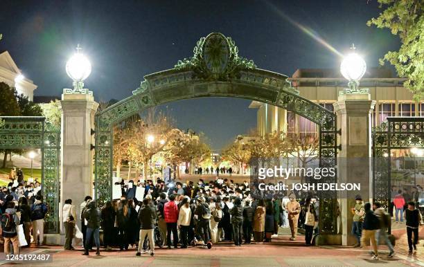 People gather to protest the Chinese governments continued continued zero-Covid policies at the University of California Berkeley campus in Berkeley,...