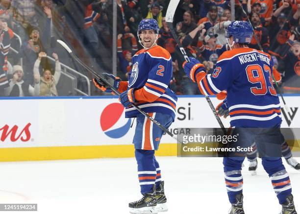 Evan Bouchard of the Edmonton Oilers is all smiles after scoring late in the third period against the Florida Panthers on November 28, 2022 at Rogers...