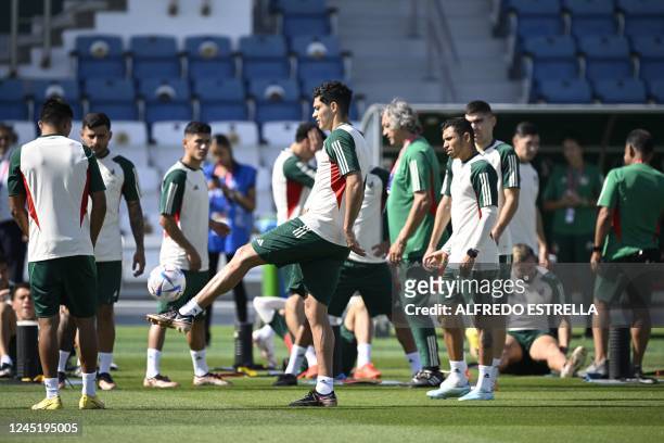 Mexico's forward Raul Jimenez takes part in a training session at the Al Khor SC in Al Khor, north of Doha north of Doha on November 29 on the eve of...