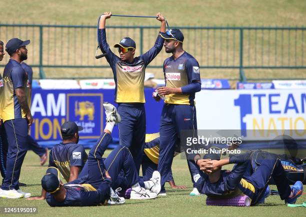 Sri Lankan cricket team players participate in practice at the Pallekele International Cricket Stadium in Kandy on November 29 ahead of their final...