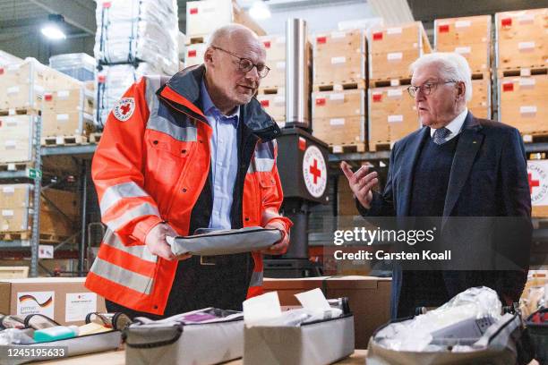 President Frank-Walter Steinmeier during a visit with Christof Johnen , Head of International Cooperation, at a logistics center of the German Red...