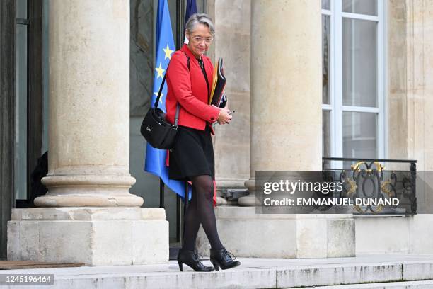 French Prime Minister Elisabeth Borne leaves after the weekly cabinet meeting at the presidential Elysee Presidential Palace in Paris on November 29,...