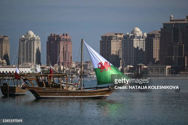 Traditional Qatari Dhow boat bearing Wales' sail is pictured in Doha on November 29 during the Qatar 2022 World Cup football tournament.