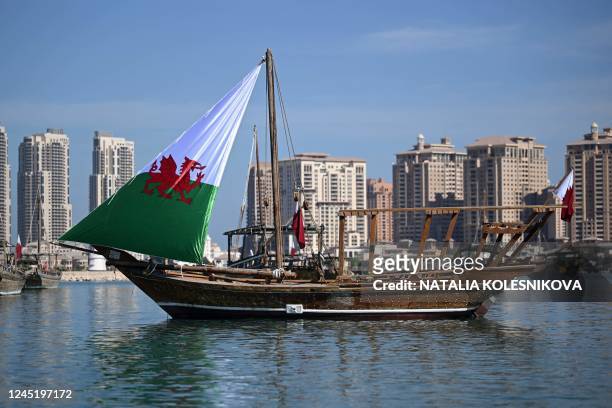 Traditional Qatari Dhow boat bearing Wales' sail is pictured in Doha on November 29 during the Qatar 2022 World Cup football tournament.