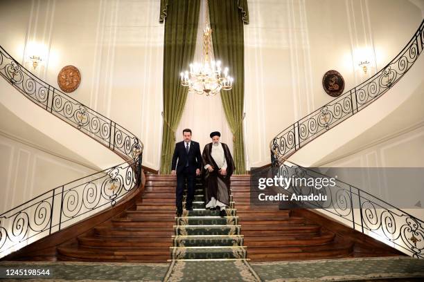 Iranian President Ebrahim Raisi and Iraqi Prime Minister Mohammed Shia al-Sudani hold a joint press conference after their meeting in Tehran, Iran on...